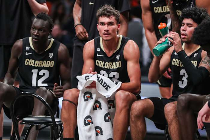 Dec 10, 2023; Brooklyn, New York, USA; Colorado Buffaloes forwards Bangot Dak (12), Tristan da Silva (23) and guard Julian Hammond III (3) at Barclays Center